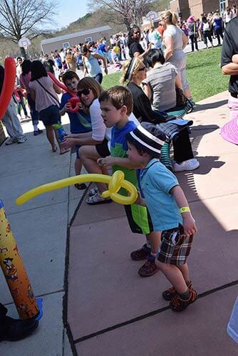 Pravin performing at an elementary school
