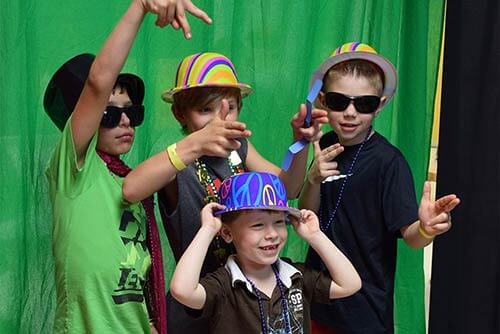 Pravin performing at an elementary school